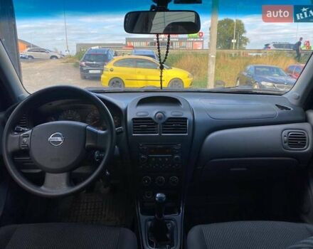 Зелений Ніссан Альмера, об'ємом двигуна 1.6 л та пробігом 75 тис. км за 5990 $, фото 12 на Automoto.ua