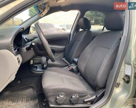 Зелений Ніссан Альмера, об'ємом двигуна 1.6 л та пробігом 75 тис. км за 5990 $, фото 8 на Automoto.ua