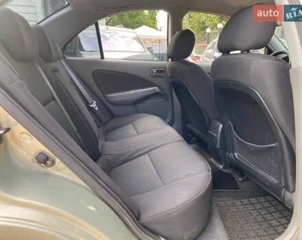 Зелений Ніссан Альмера, об'ємом двигуна 1.6 л та пробігом 75 тис. км за 5990 $, фото 10 на Automoto.ua