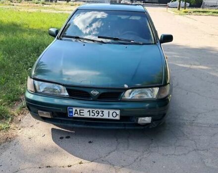 Зелений Ніссан Альмера, об'ємом двигуна 1.4 л та пробігом 280 тис. км за 950 $, фото 1 на Automoto.ua