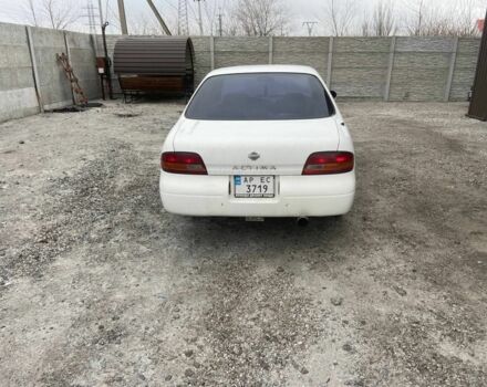 Белый Ниссан Альтима, объемом двигателя 2 л и пробегом 234 тыс. км за 1400 $, фото 6 на Automoto.ua