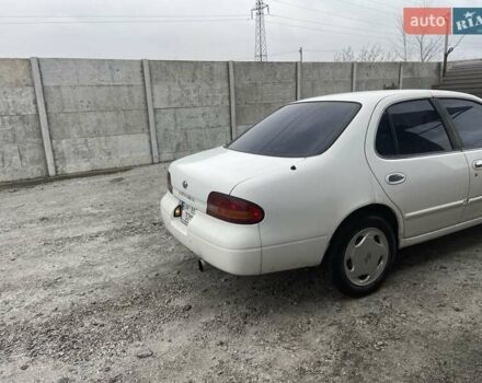 Белый Ниссан Альтима, объемом двигателя 2 л и пробегом 234 тыс. км за 1800 $, фото 2 на Automoto.ua