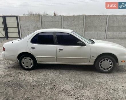 Белый Ниссан Альтима, объемом двигателя 2 л и пробегом 234 тыс. км за 1800 $, фото 3 на Automoto.ua