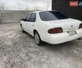 Белый Ниссан Альтима, объемом двигателя 2 л и пробегом 234 тыс. км за 1800 $, фото 1 на Automoto.ua