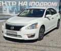 Белый Ниссан Альтима, объемом двигателя 25 л и пробегом 250 тыс. км за 7900 $, фото 1 на Automoto.ua