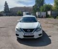 Белый Ниссан Альтима, объемом двигателя 2.49 л и пробегом 130 тыс. км за 14000 $, фото 1 на Automoto.ua