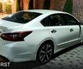 Білий Ніссан Альтіма, об'ємом двигуна 2.5 л та пробігом 85 тис. км за 14000 $, фото 1 на Automoto.ua