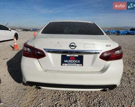 Білий Ніссан Альтіма, об'ємом двигуна 2.49 л та пробігом 164 тис. км за 1600 $, фото 5 на Automoto.ua