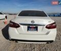 Білий Ніссан Альтіма, об'ємом двигуна 2.49 л та пробігом 164 тис. км за 1600 $, фото 5 на Automoto.ua
