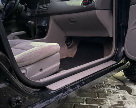 Черный Ниссан Альтима, объемом двигателя 2.4 л и пробегом 197 тыс. км за 3000 $, фото 4 на Automoto.ua