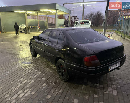 Черный Ниссан Альтима, объемом двигателя 2.4 л и пробегом 197 тыс. км за 3000 $, фото 1 на Automoto.ua