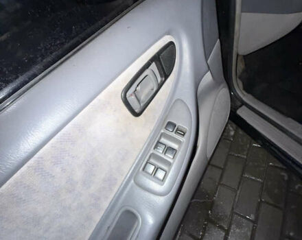 Черный Ниссан Альтима, объемом двигателя 2.4 л и пробегом 197 тыс. км за 3000 $, фото 10 на Automoto.ua