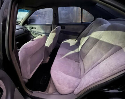 Черный Ниссан Альтима, объемом двигателя 2.4 л и пробегом 197 тыс. км за 3000 $, фото 13 на Automoto.ua