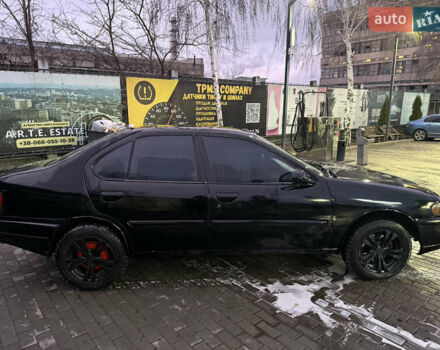 Черный Ниссан Альтима, объемом двигателя 2.4 л и пробегом 197 тыс. км за 3000 $, фото 3 на Automoto.ua