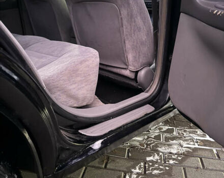 Черный Ниссан Альтима, объемом двигателя 2.4 л и пробегом 197 тыс. км за 3000 $, фото 5 на Automoto.ua