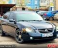 Черный Ниссан Альтима, объемом двигателя 2.5 л и пробегом 224 тыс. км за 3500 $, фото 1 на Automoto.ua