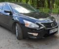 Чорний Ніссан Альтіма, об'ємом двигуна 2.49 л та пробігом 198 тис. км за 7999 $, фото 1 на Automoto.ua