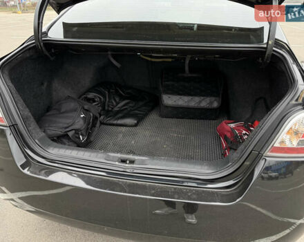 Черный Ниссан Альтима, объемом двигателя 2.49 л и пробегом 160 тыс. км за 9700 $, фото 7 на Automoto.ua