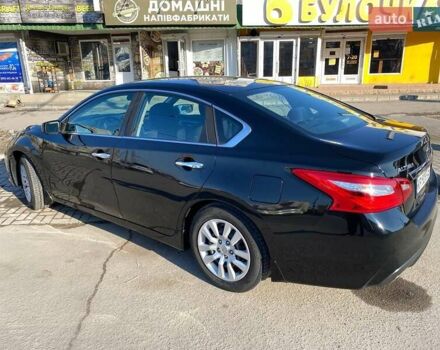 Черный Ниссан Альтима, объемом двигателя 2.49 л и пробегом 153 тыс. км за 8650 $, фото 1 на Automoto.ua