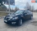 Черный Ниссан Альтима, объемом двигателя 2.5 л и пробегом 160 тыс. км за 8700 $, фото 1 на Automoto.ua