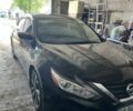 Черный Ниссан Альтима, объемом двигателя 2.49 л и пробегом 114 тыс. км за 11000 $, фото 1 на Automoto.ua
