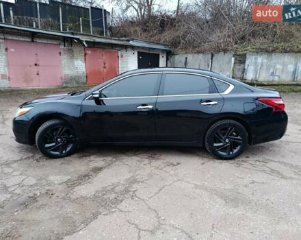 Чорний Ніссан Альтіма, об'ємом двигуна 2.49 л та пробігом 129 тис. км за 11700 $, фото 1 на Automoto.ua