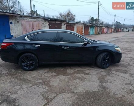 Чорний Ніссан Альтіма, об'ємом двигуна 2.49 л та пробігом 129 тис. км за 11700 $, фото 5 на Automoto.ua