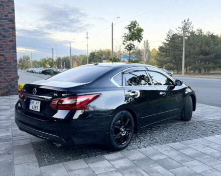 Черный Ниссан Альтима, объемом двигателя 2.49 л и пробегом 226 тыс. км за 10800 $, фото 6 на Automoto.ua