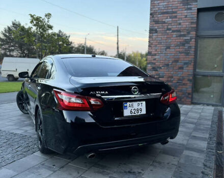 Черный Ниссан Альтима, объемом двигателя 2.49 л и пробегом 226 тыс. км за 10800 $, фото 5 на Automoto.ua