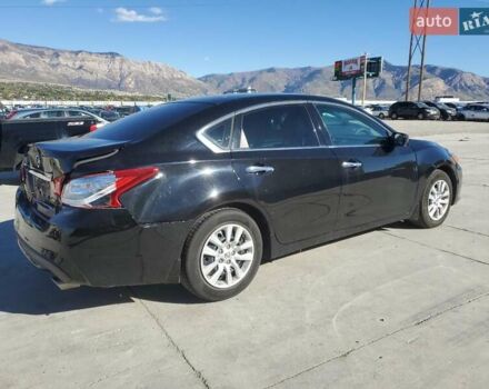 Черный Ниссан Альтима, объемом двигателя 2.49 л и пробегом 129 тыс. км за 1300 $, фото 2 на Automoto.ua