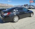 Черный Ниссан Альтима, объемом двигателя 2.49 л и пробегом 129 тыс. км за 1300 $, фото 2 на Automoto.ua