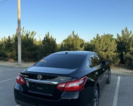 Черный Ниссан Альтима, объемом двигателя 2.5 л и пробегом 163 тыс. км за 9100 $, фото 4 на Automoto.ua