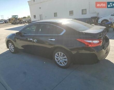 Черный Ниссан Альтима, объемом двигателя 2.49 л и пробегом 129 тыс. км за 1300 $, фото 1 на Automoto.ua