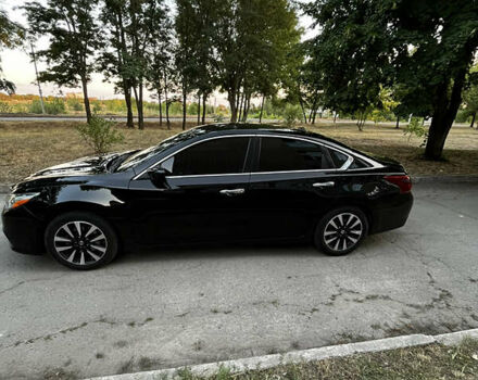 Черный Ниссан Альтима, объемом двигателя 2.49 л и пробегом 139 тыс. км за 11850 $, фото 2 на Automoto.ua