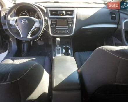 Черный Ниссан Альтима, объемом двигателя 2.49 л и пробегом 129 тыс. км за 1300 $, фото 7 на Automoto.ua