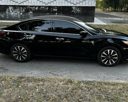 Черный Ниссан Альтима, объемом двигателя 2.49 л и пробегом 139 тыс. км за 11850 $, фото 5 на Automoto.ua