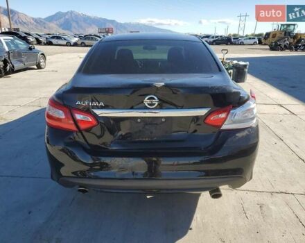Черный Ниссан Альтима, объемом двигателя 2.49 л и пробегом 129 тыс. км за 1300 $, фото 5 на Automoto.ua