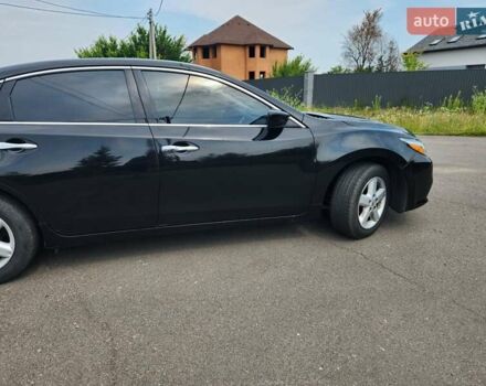 Черный Ниссан Альтима, объемом двигателя 2.5 л и пробегом 229 тыс. км за 9800 $, фото 1 на Automoto.ua