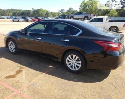 Черный Ниссан Альтима, объемом двигателя 2.5 л и пробегом 53 тыс. км за 3000 $, фото 1 на Automoto.ua