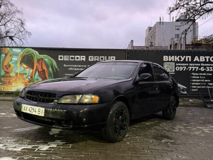 Черный Ниссан Альтима, объемом двигателя 2.4 л и пробегом 197 тыс. км за 3000 $, фото 1 на Automoto.ua