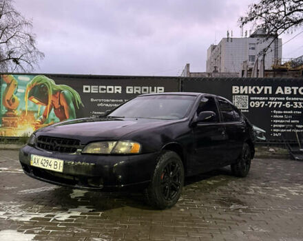 Черный Ниссан Альтима, объемом двигателя 2.4 л и пробегом 197 тыс. км за 3000 $, фото 1 на Automoto.ua