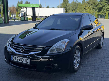 Черный Ниссан Альтима, объемом двигателя 2.49 л и пробегом 170 тыс. км за 6200 $, фото 1 на Automoto.ua