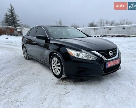 Черный Ниссан Альтима, объемом двигателя 2.49 л и пробегом 206 тыс. км за 8700 $, фото 1 на Automoto.ua