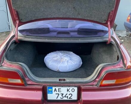 Красный Ниссан Альтима, объемом двигателя 2.4 л и пробегом 200 тыс. км за 1850 $, фото 9 на Automoto.ua