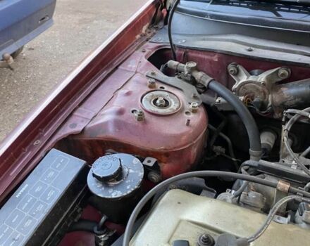 Красный Ниссан Альтима, объемом двигателя 2.4 л и пробегом 200 тыс. км за 1850 $, фото 6 на Automoto.ua