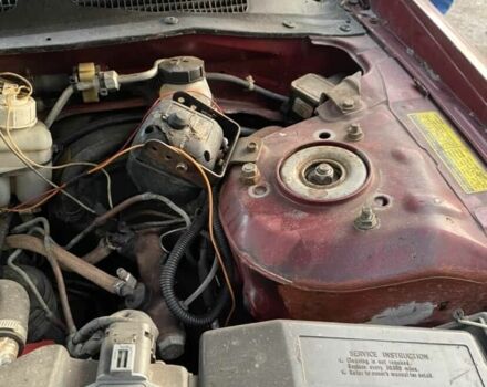 Красный Ниссан Альтима, объемом двигателя 2.4 л и пробегом 200 тыс. км за 1850 $, фото 7 на Automoto.ua