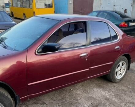 Красный Ниссан Альтима, объемом двигателя 2.4 л и пробегом 200 тыс. км за 1850 $, фото 11 на Automoto.ua