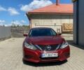 Красный Ниссан Альтима, объемом двигателя 2.49 л и пробегом 171 тыс. км за 10500 $, фото 1 на Automoto.ua