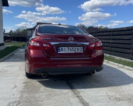 Красный Ниссан Альтима, объемом двигателя 2.49 л и пробегом 162 тыс. км за 11000 $, фото 4 на Automoto.ua