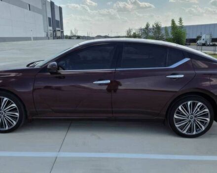 Красный Ниссан Альтима, объемом двигателя 2.5 л и пробегом 24 тыс. км за 10000 $, фото 1 на Automoto.ua